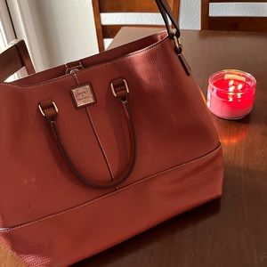 2 dooney and bourke bags, one with matching wallet